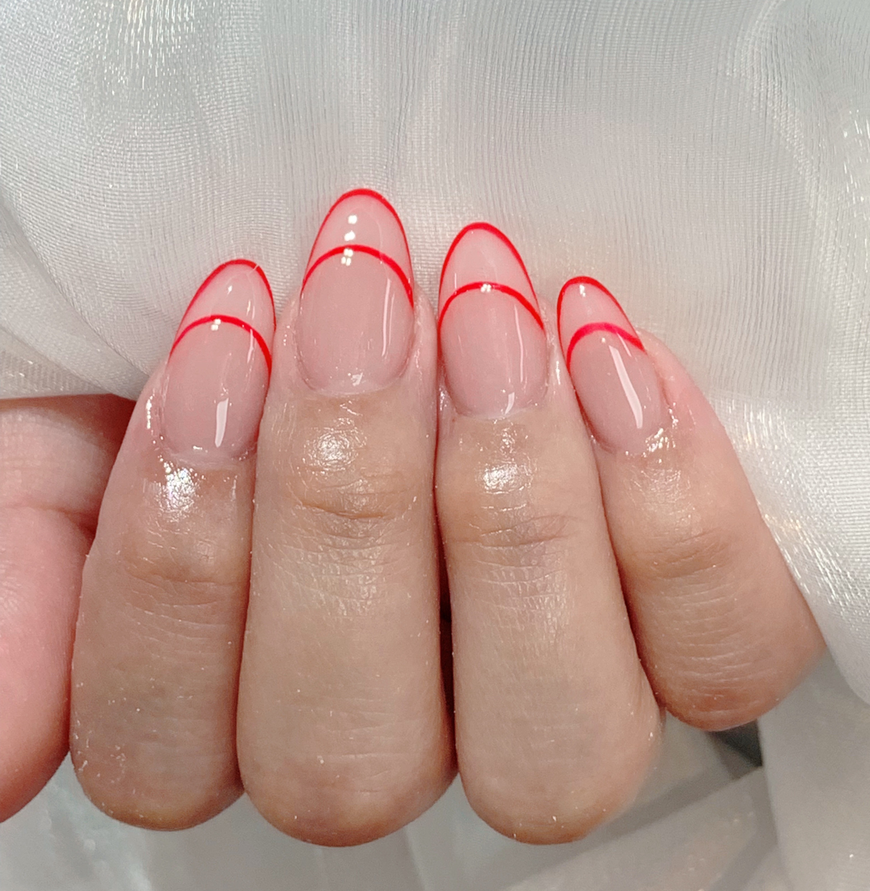 Minimal red French manicure at Young Nail Bar
